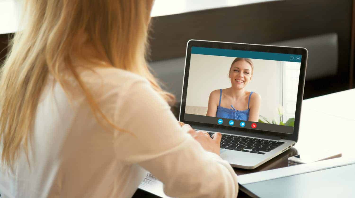 two young women chatting online by how to video chat